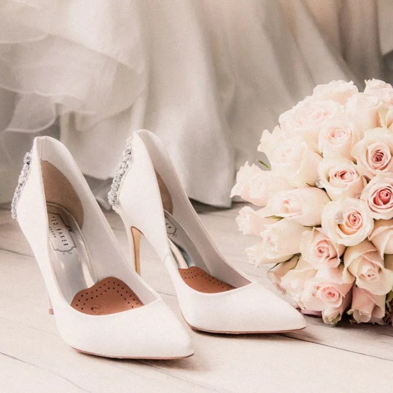 Shoes and a bouquet of flowers.