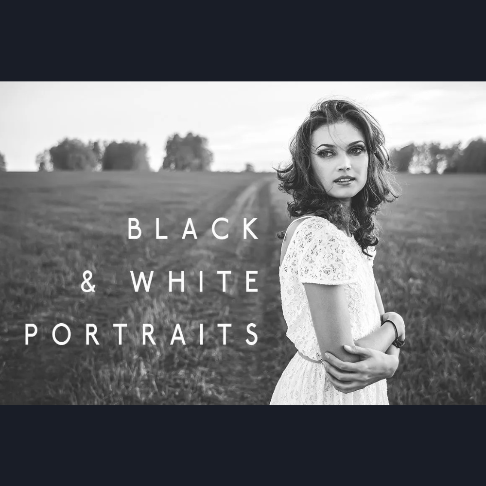 Black and white portrait of woman in field.
