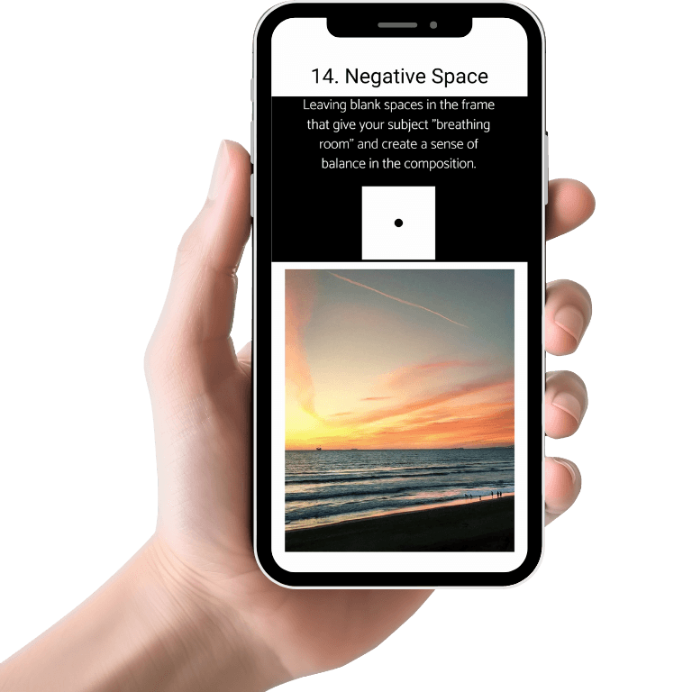 Person holding composition techniques pdf on their phone.