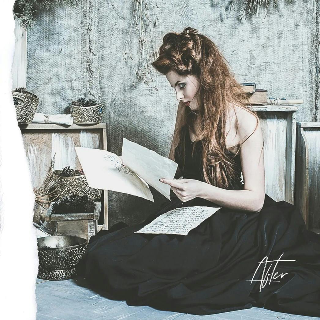 Woman in black dress reading old letters.