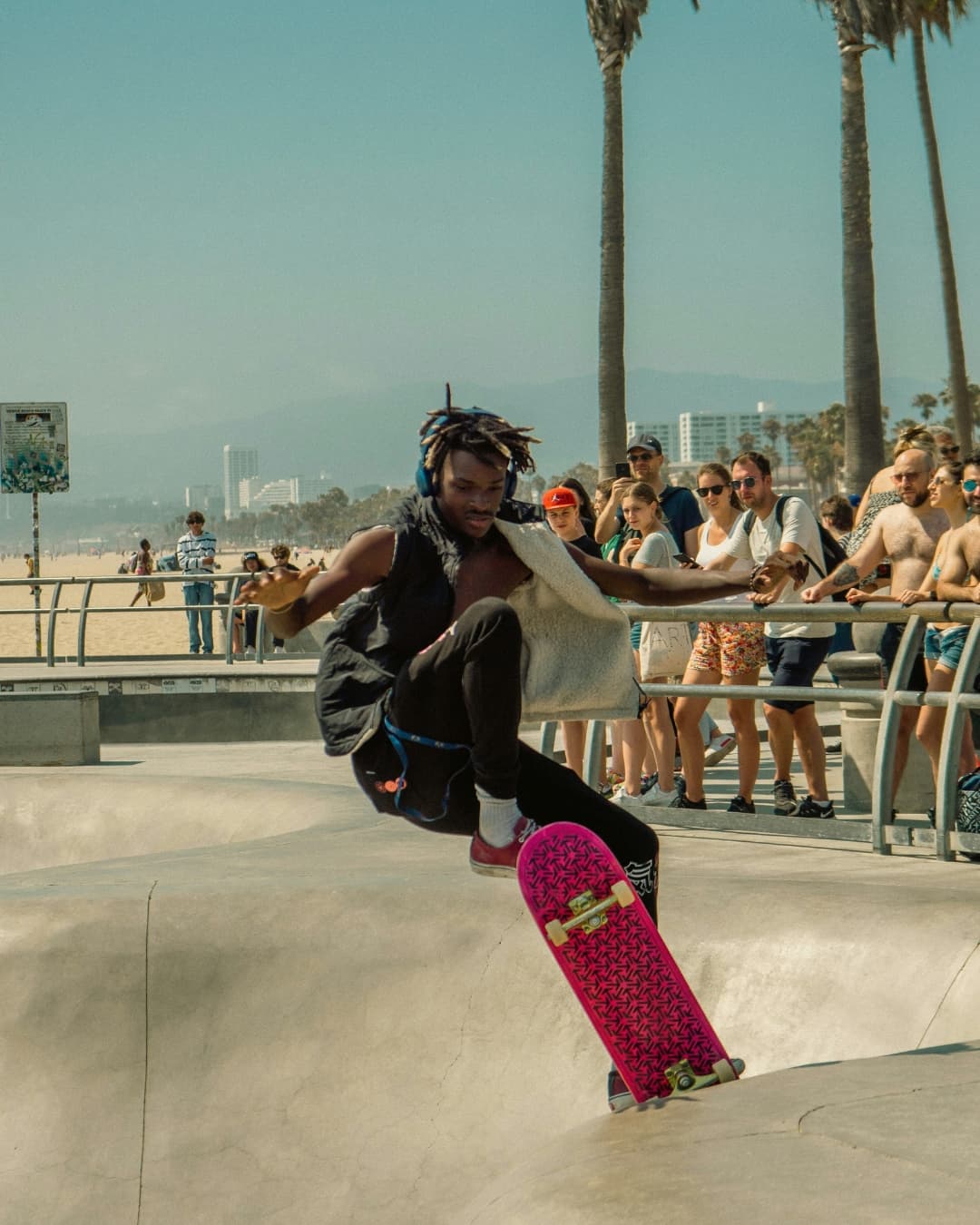 Example street portrait of man skating in Venice Beach.