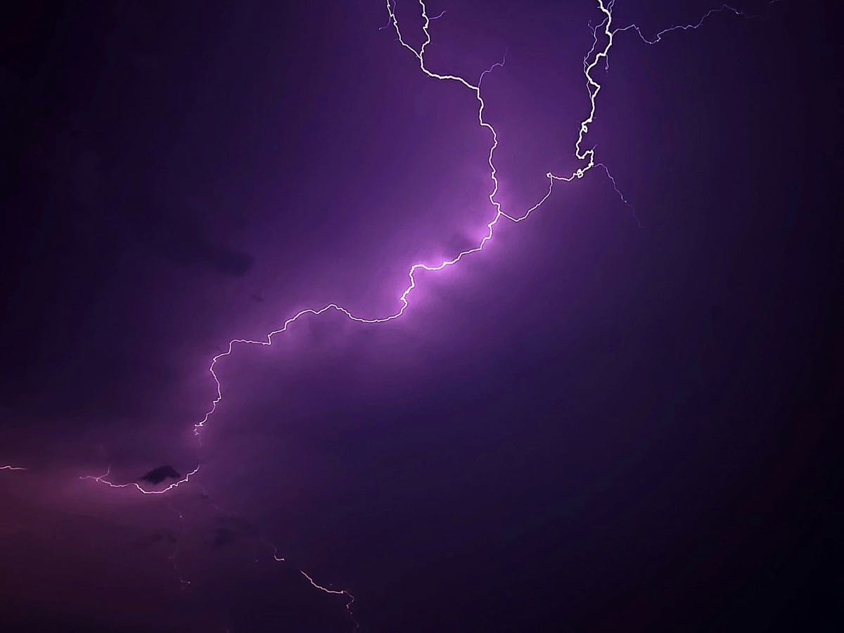 Photo of lightning in the sky.