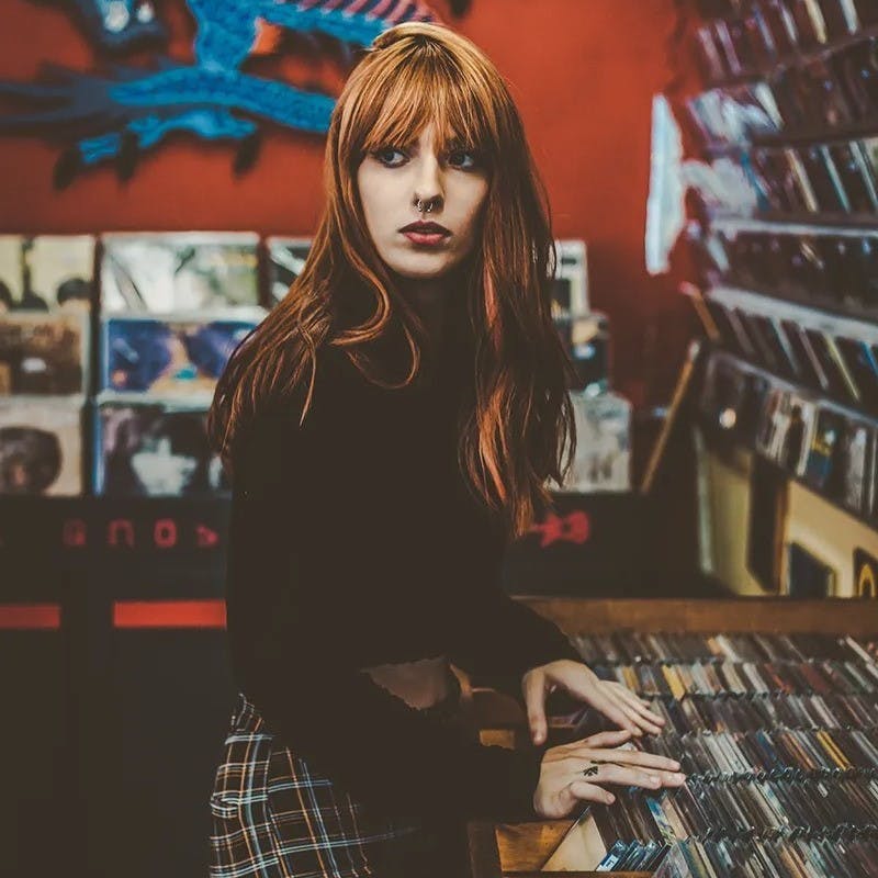 Woman in a music store.