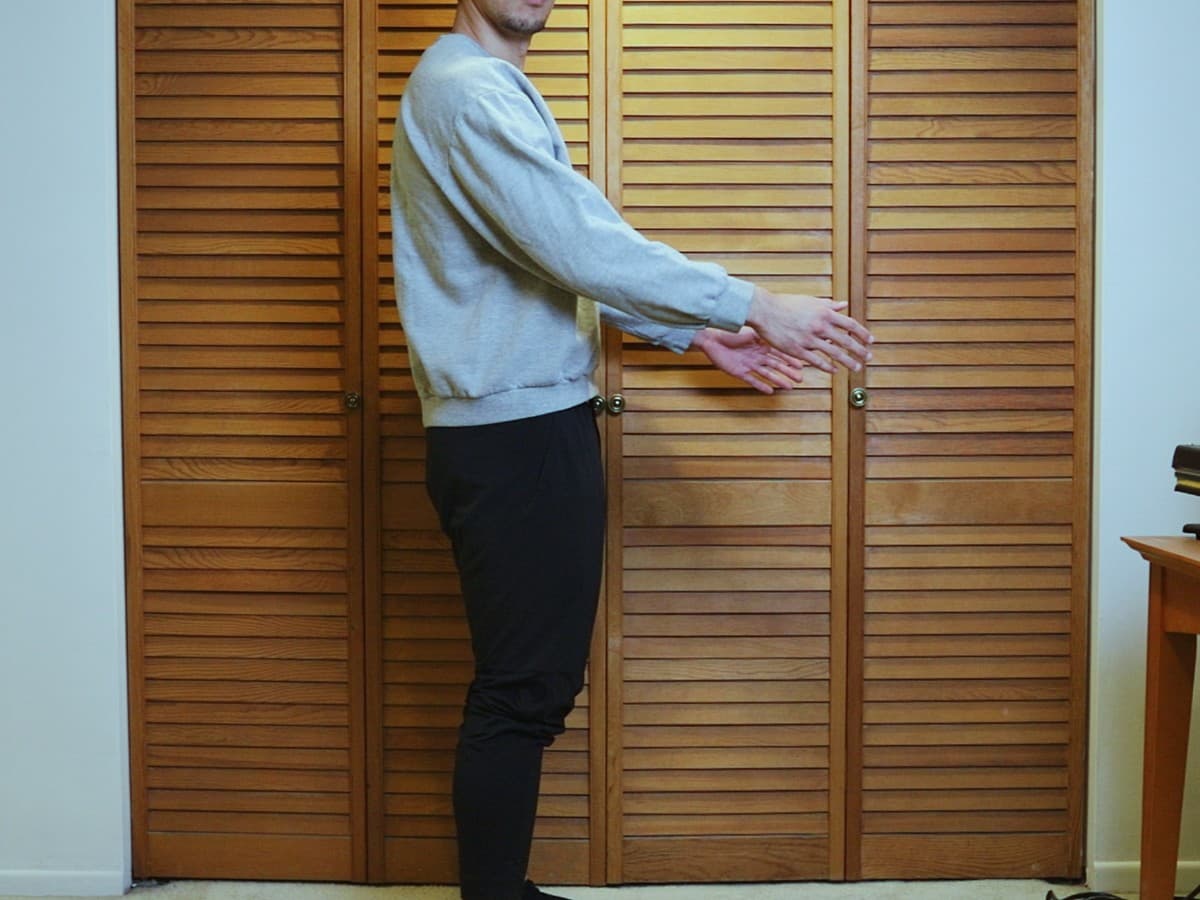 90-Degree angle posing Man posing at 90 degree angle from the camera.