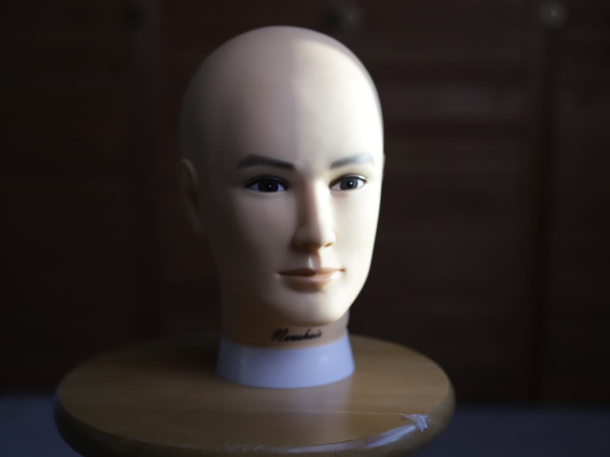 Key light only - Higher lighting ratio Mannequin head being lit by key light.