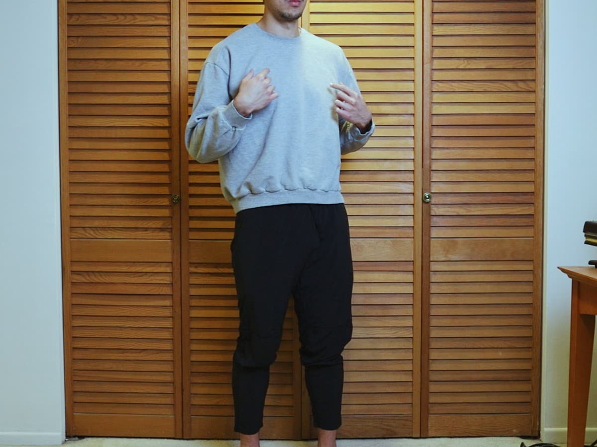Shoulder move with collarbone Man posing by moving his shoulder with collarbone.